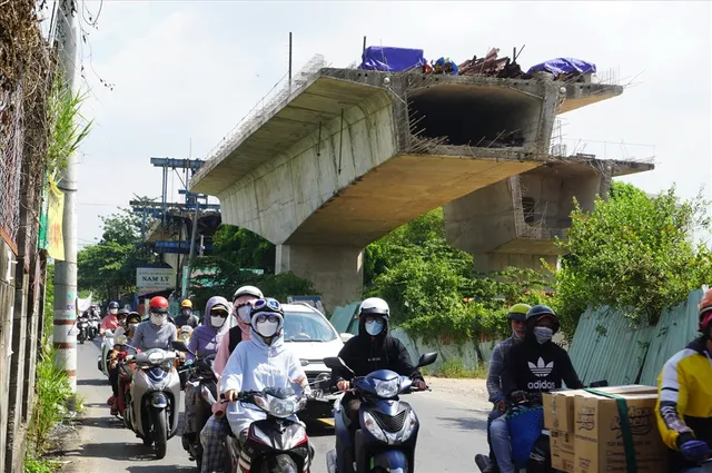 Những cây cầu treo ở TP Hồ Chí Minh chờ ngày nối nhịp - Ảnh 6.