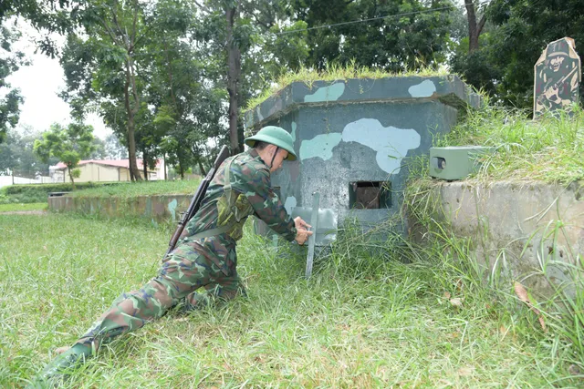 Những người thầy áo lính “luyện quân” ở trường quân sự - Ảnh 1.