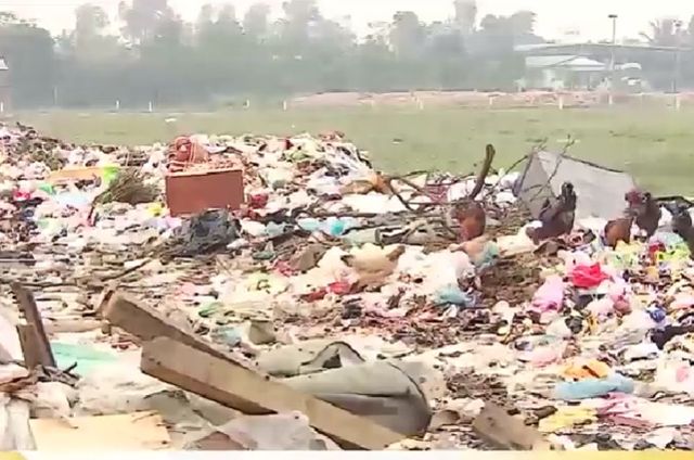 Người dân khổ vì ô nhiễm từ bãi tập kết rác - Ảnh 1.