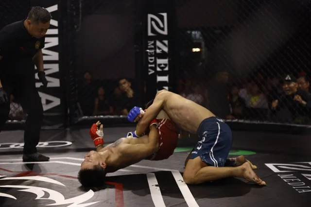 Á quân tán thủ thế giới thắng knock-out nhanh nhất giải MMA Việt Nam  - Ảnh 2.