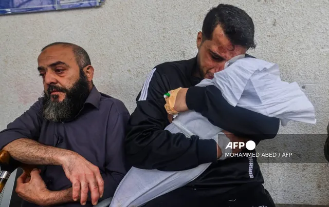Israel không kích Rafah khiến ít nhất 22 người tử vong, trong đó có 18 trẻ em - Ảnh 1.
