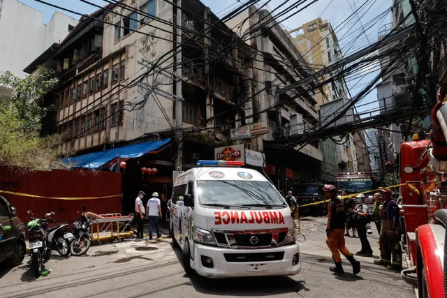 Cháy nhà cao tầng ở thủ đô Manila (Philippines), 11 người thiệt mạng - Ảnh 1.