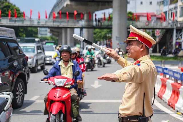 Cảnh sát giao thông Hà Nội triển khai nhiều biện pháp bảo đảm giao thông dịp lễ Quốc khánh - Ảnh 1.