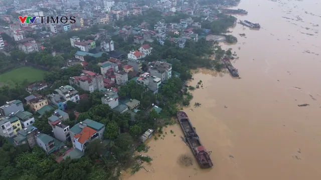 Quận Bắc Từ Liêm di dời người dân khu vực ngoài đê sông Hồng (Hà Nội) - Ảnh 1.