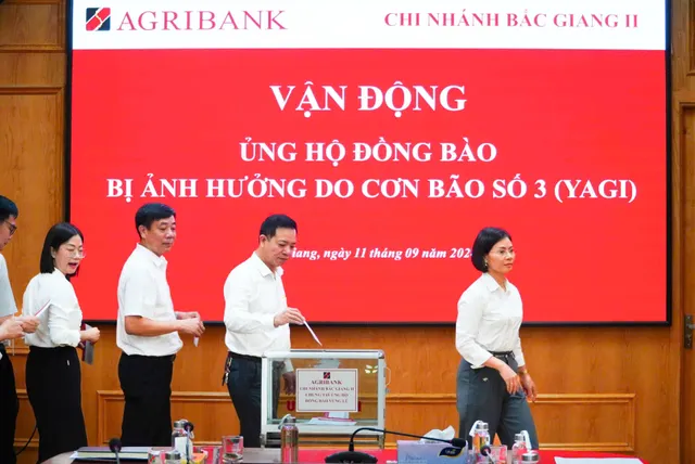 Cán bộ, người lao động Agribank ủng hộ 01 ngày lương khắc phục hậu quả bão số 3 - Ảnh 1.