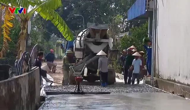 Người dân làng Phụng Nghiêm (Nam Định) đồng lòng hiến đất mở đường - Ảnh 1.