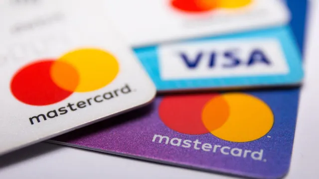 EU điều tra phí dịch vụ của thẻ tín dụng Visa và Mastercard - Ảnh 1.