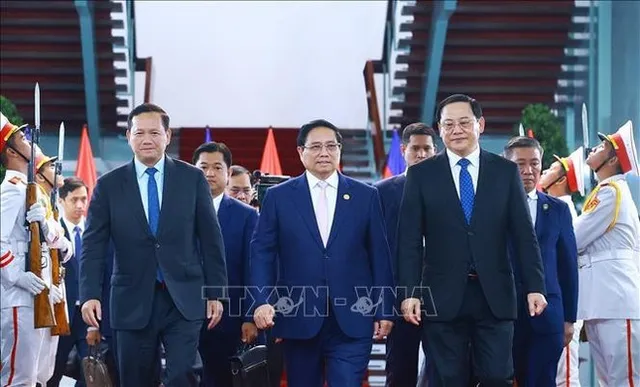 Vietnamese, Lao, Cambodian PMs meet in HCM City - Ảnh 1.
