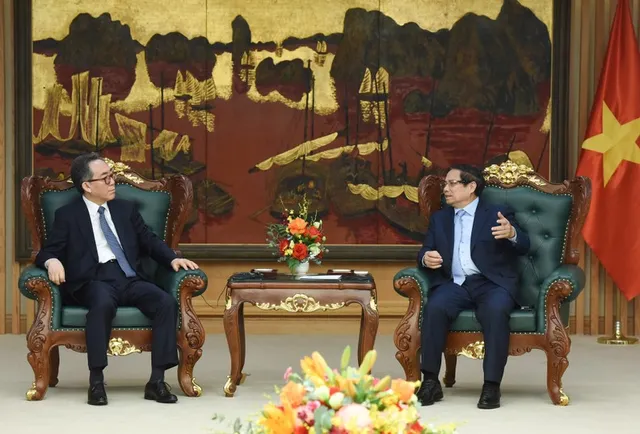 In Pictures: Prime Minister Pham Minh Chinh meets with Minister of Foreign Affairs of the RoK Cho Tae-yul - Ảnh 1.