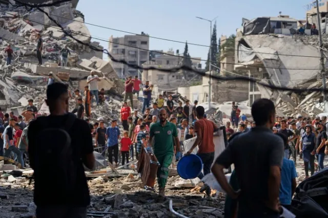 Hàng nghìn gia đình Palestine tiếp tục sơ tán khỏi miền Bắc Gaza- Ảnh 1. Hàng nghìn gia đình Palestine tiếp tục sơ tán khỏi miền Bắc Gaza- Ảnh 1.