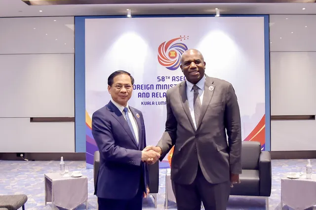 Vietnamese Deputy PM, FM meets with US, EC, UK officials in Malaysia - Ảnh 1.