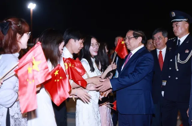 PM Pham Minh Chinh arrives in Tianjin, beginning working trip to attend SCO Summit - Ảnh 1.