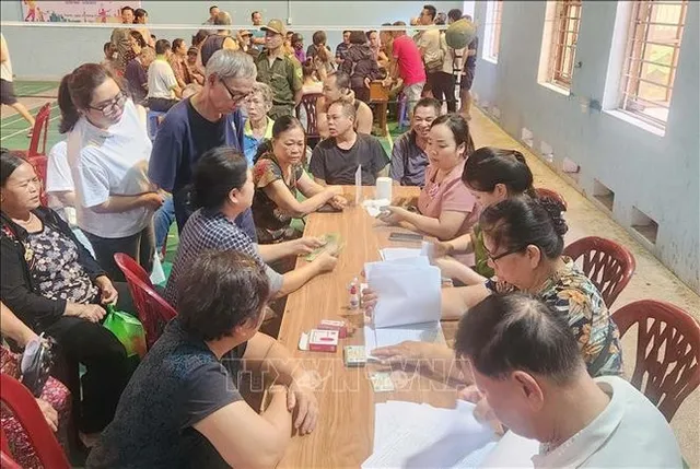 State Treasury disburses nearly 5.69 trillion VND as National Day gifts to 1,929 communes - Ảnh 1.