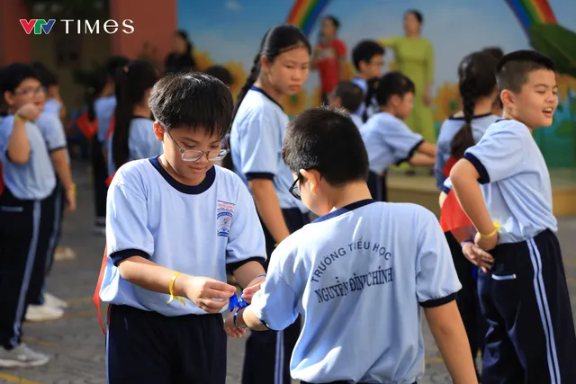 Học sinh TP Hồ Chí Minh tích cực tập luyện, hướng đến kỷ lục Võ nhạc Vovinam- Ảnh 10.