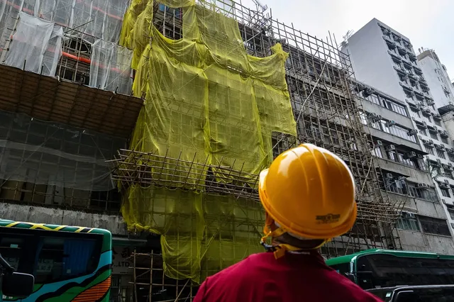 Hong Kong (Trung Quốc) cấm hút thuốc tại công trường xây dựng sau vụ cháy chung cư- Ảnh 1. Hong Kong (Trung Quốc) cấm hút thuốc tại công trường xây dựng sau vụ cháy chung cư- Ảnh 1.