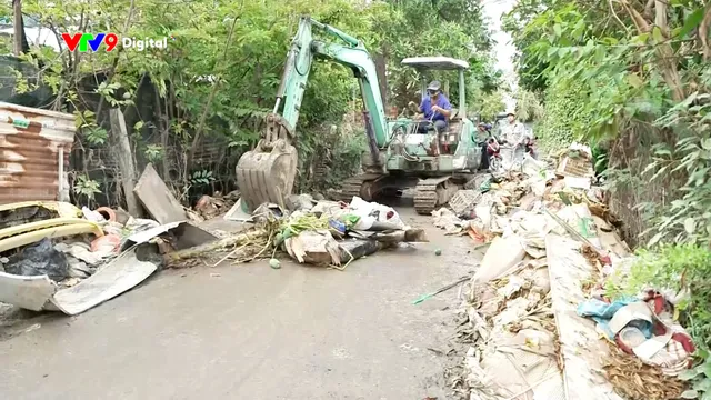 Chung tay giảm áp lực tồn đọng rác sau lũ