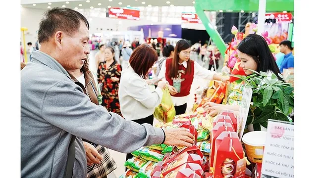 Businesses step up production for Tet holiday - Ảnh 1.