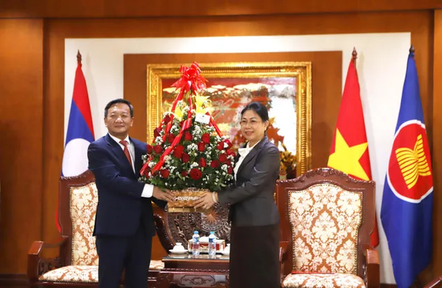 Ambassador hosts Lao officials on CPV’s 96th anniversary - Ảnh 1.