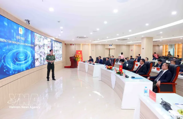 Hanoi hosts Lao public security delegation, expands bilateral coordination - Ảnh 1.