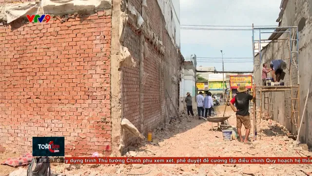 Người dân di dời bàn giao mặt bằng để mở rộng Quốc lộ 13