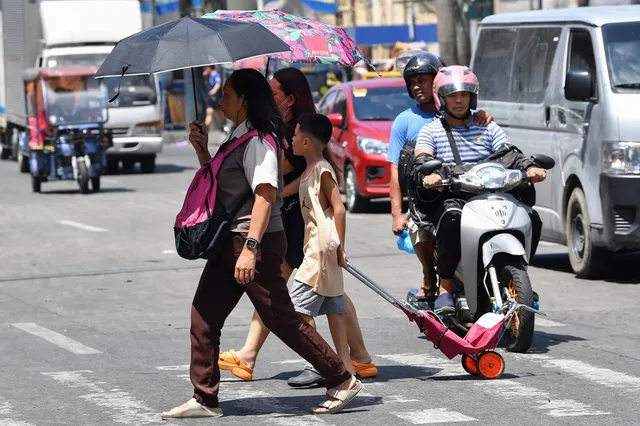 Nhiều nước châu Á chật vật ứng phó nắng nóng gay gắt- Ảnh 1. Nhiều nước châu Á chật vật ứng phó nắng nóng gay gắt- Ảnh 1.