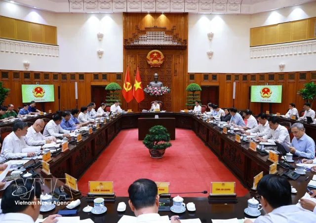 PM chairs meeting on judgment enforcement, asset recovery - Ảnh 1.