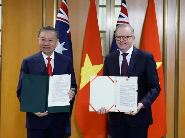 Vietnamese, Australian leaders witness exchange of cooperation documents - Ảnh 1.