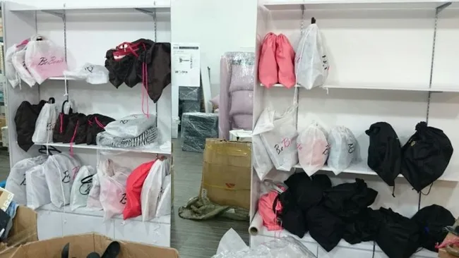 Branded handbags and accessories seized from Ong’s company premises