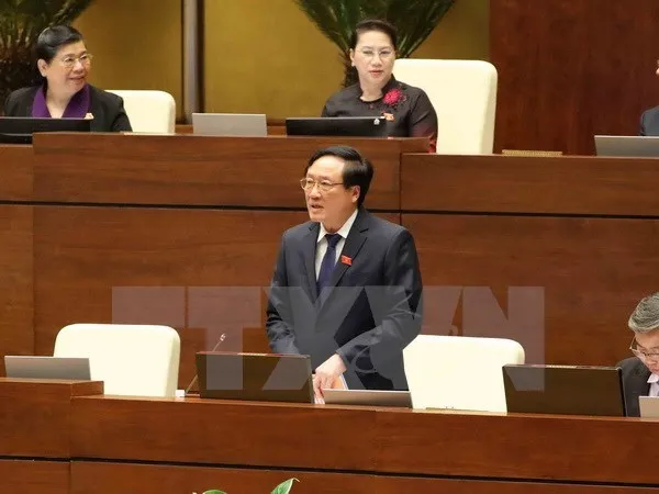 Chief Justice of the People’s Supreme Court Nguyen Hoa Binh addresses lawmakers' questions (Source: VNA)