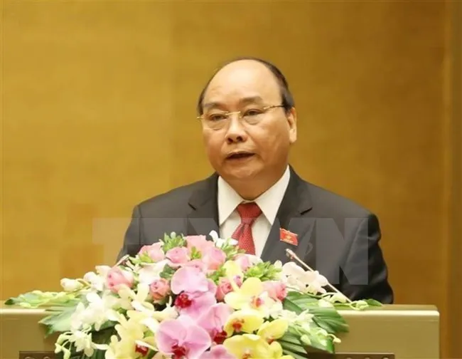 Prime Minister Nguyen Xuan Phuc ​addresses the fourth session of the 14th National Assembly (Photo: VNA)