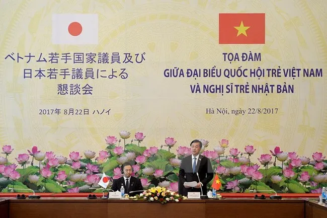 At the meeting (Photo: VNA)