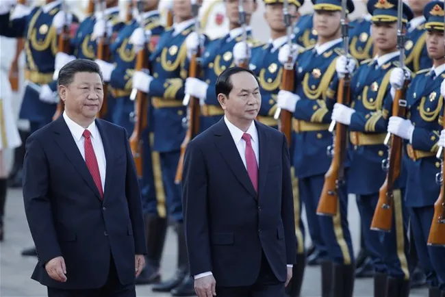 Vietnam’s President Tran Dai Quang (R) and China’s President Xi Jinping inspect honor guards during a welcoming ceremony outside the Great Hall of the People, in Beijing, China on May 11 - PHOTO: REUTERS
