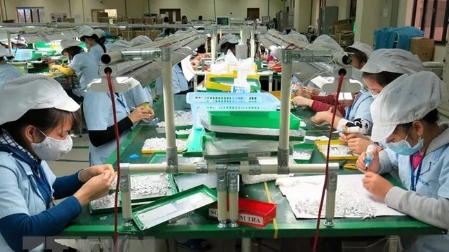 Manufacturing remains the most attractive industry for foreign investors. (Illustrative photo: VNA)