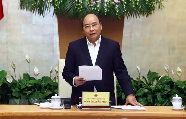 Prime Minister Nguyen Xuan Phuc at the Government's monthly meeting (Photo: VNA)