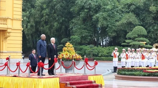Party General Secretary and State President Nguyen Phu Trong chairs an official welcome ceremony for Indian President Ram Nath Kovind in Hanoi on November 20 (Photo: VNA)