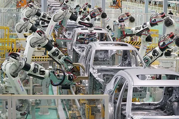 Robot arms are seen at the newly-opened Mazda plant of Thaco - PHOTO: THACO