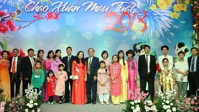 Participants at the get-together pose for a photo (credit: ND/Tran Hai)