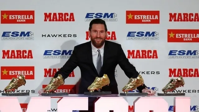 FC Barcelona's Lionel Messi poses with his five European Golden Shoe awards - Antiga Fabrica Estrella Damm, Barcelona, Spain - December 18, 2018. (Photo: Reuters)