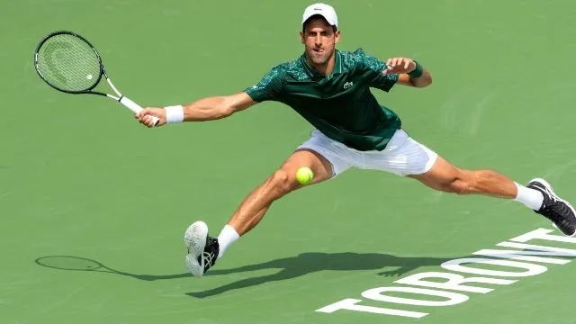 Reigning Wimbledon champion Novak Djokovic moves on Wednesday at the Rogers Cup in Toronto. (Photo: Icon Sportswire)