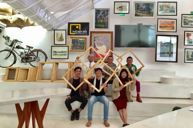 The artists and organizers pose for a group photo at the exhibition - PHOTO: COURTESY OF THE ORGANIZER