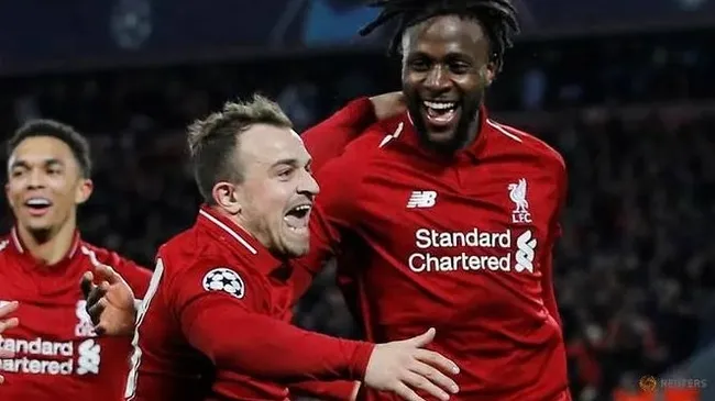 Champions League Semi Final Second Leg - Liverpool v FC Barcelona - Anfield, Liverpool, Britain - May 7, 2019 Liverpool's Divock Origi celebrates scoring their fourth goal with Xherdan Shaqiri and Trent Alexander-Arnold. (Reuters)