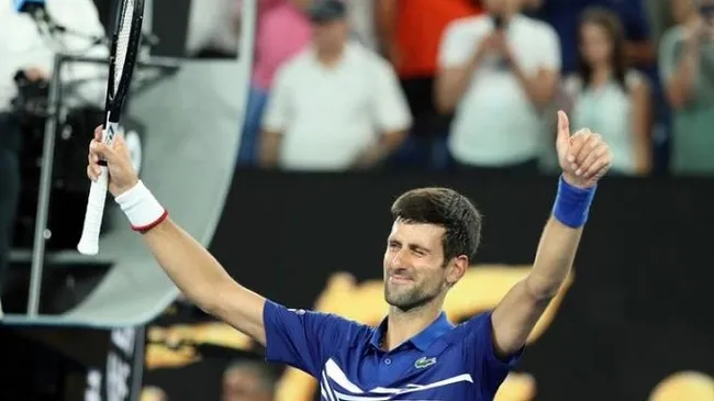 Serbia's Novak Djokovic celebrates after winning the match against France's Jo-Wilfried Tsonga. (Reuters)