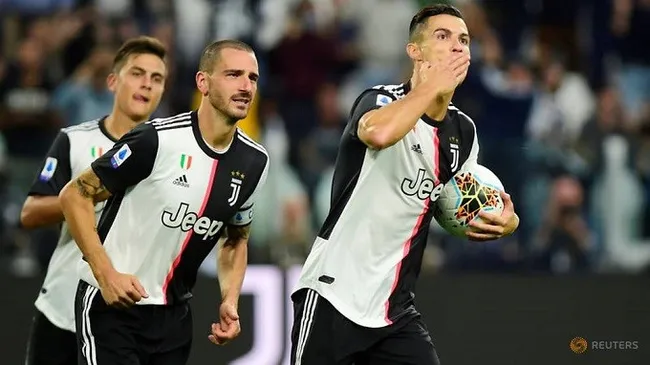 Soccer Football - Serie A - Juventus v Hellas Verona - Allianz Stadium, Turin, Italy - September 21, 2019 Juventus' Cristiano Ronaldo celebrates scoring their second goal with Leonardo Bonucci. (Reuters)