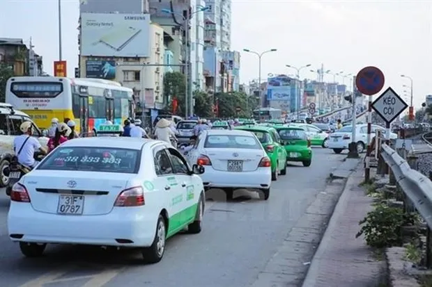 Taxi cabs operate in Hanoi (Photo: VNA)