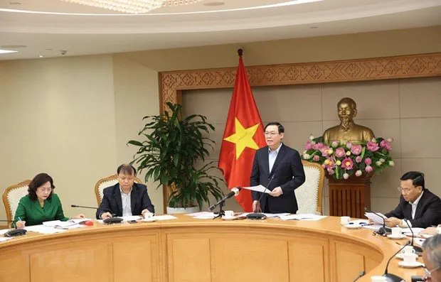 Deputy Prime Minister Vuong Dinh Hue speaks at the event. (Photo: VNA)