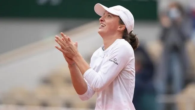 FILE PHOTO: Oct 10, 2020; Paris, France; Iga Swiatek (POL) celebrates match point during her match against Sofia Kenin (USA) on day 14 at Stade Roland Garros. (Photo: USA TODAY Sports)