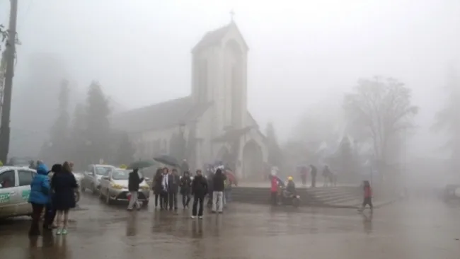 Sapa is covered in morning mist as the temperature falls to 12C.