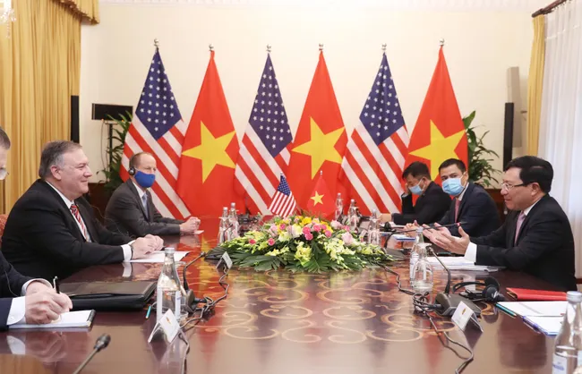 Deputy Prime Minister and Foreign Minister Pham Binh Minh (R) holds talks with US Secretary of State Mike Pompeo in Hanoi on October 30.