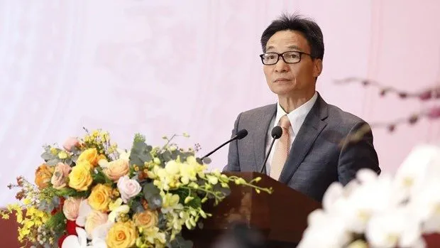 Deputy Prime Minister Vu Duc Dam addresses the conference in Hanoi on December 30 (Photo: VNA)
