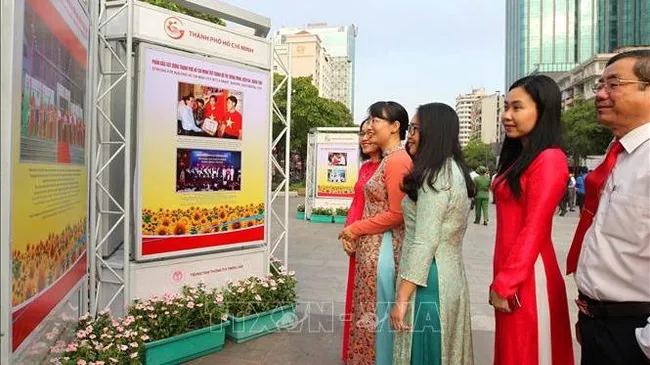 Visitors at the exhibition which opened along Nguyen Hue Pedestrian Street to celebrate Vietnamese Communist Party’s founding anniversary (Photo: VNA)